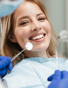 a patient receiving dental care from a dentist near Tyler